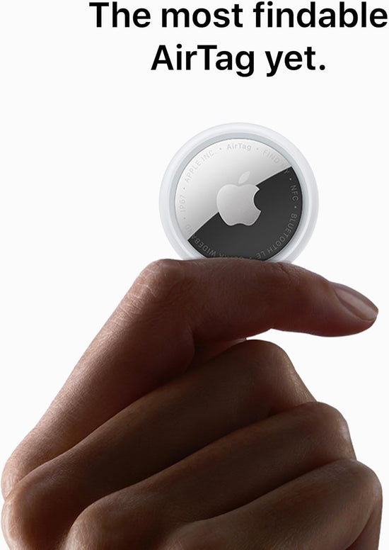 Apple-Iphone AirTag 2nd Generation Key Finder held between fingers, showcasing its compact design and tracking capabilities.
